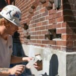 Stonehenge Masonry fixing bricks on a home